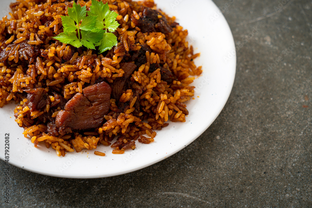 Nasi goreng - fried rice with pork in Indonesia style Nasi goreng - fried rice with pork in Indonesia style
