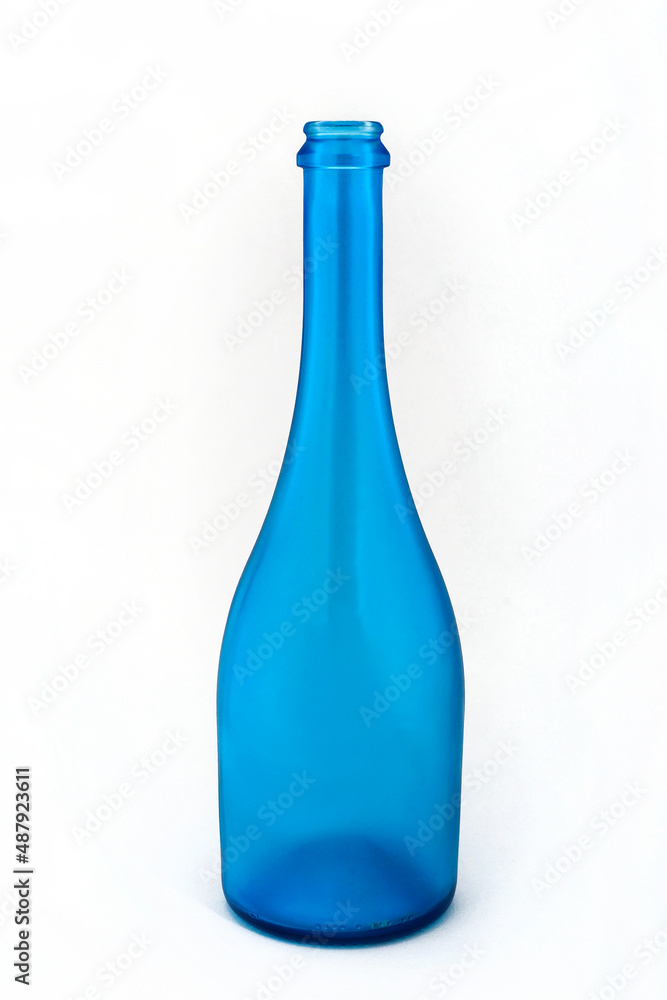 Blue bottle for alcoholic drinks isolated on white background. Blue bottle for alcoholic drinks isolated on white background.