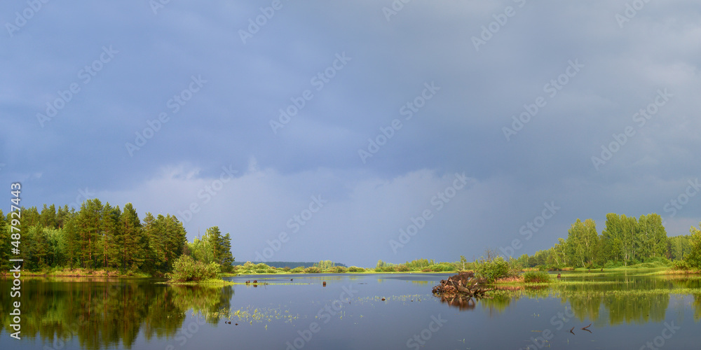Obraz premium Summer fishing on the river, beautiful panorama.