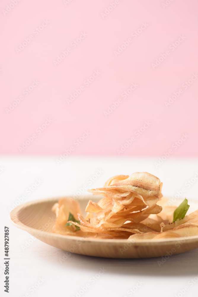 Crispy deep fried sliced organic banana chips, a popular Asian snack food