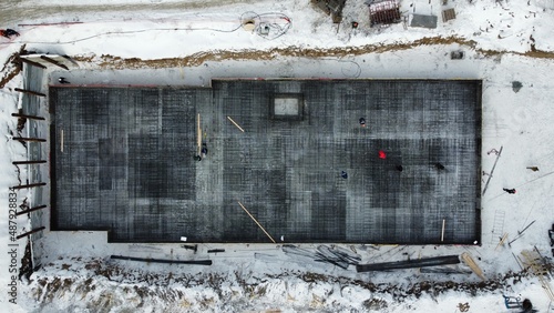 Construction of the foundation for the house. Mesh of reinforcement for pouring the foundation. Development. Construction industry. High quality photo