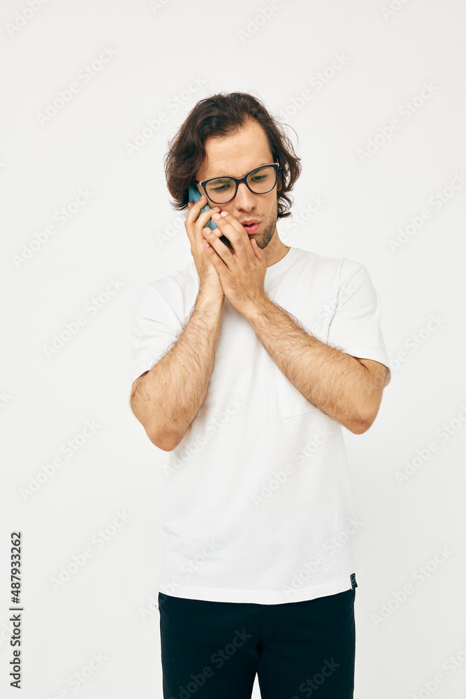 Attractive man telephone communication hand gesture isolated background Attractive man telephone communication hand gesture isolated background