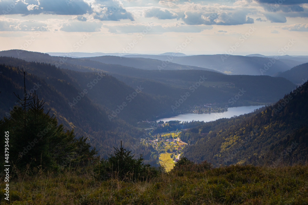 Mountain landscape during autumn fall with lake and forest at Balveurches peak in the Massif des Vosges France