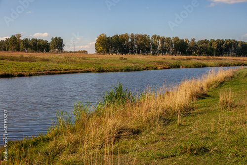 landscape. The largest lake. Blue sky with beautiful clouds. park in summer. Blue water in the river. © ELENA