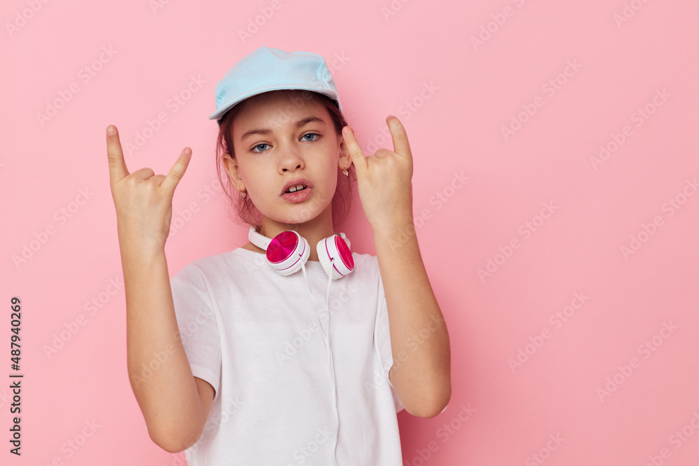 cute girl wearing headphones posing emotions Lifestyle unaltered cute girl wearing headphones posing emotions Lifestyle unaltered