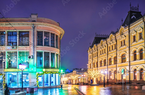 Ancient buildings on the Kuznetsky bridge in Moscow in the light of night lights