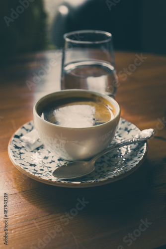 a cup of aromatic coffee on the table, black coffee Americano