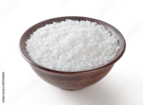 Sea salt in ceramic bowl isolated on white background with clipping path