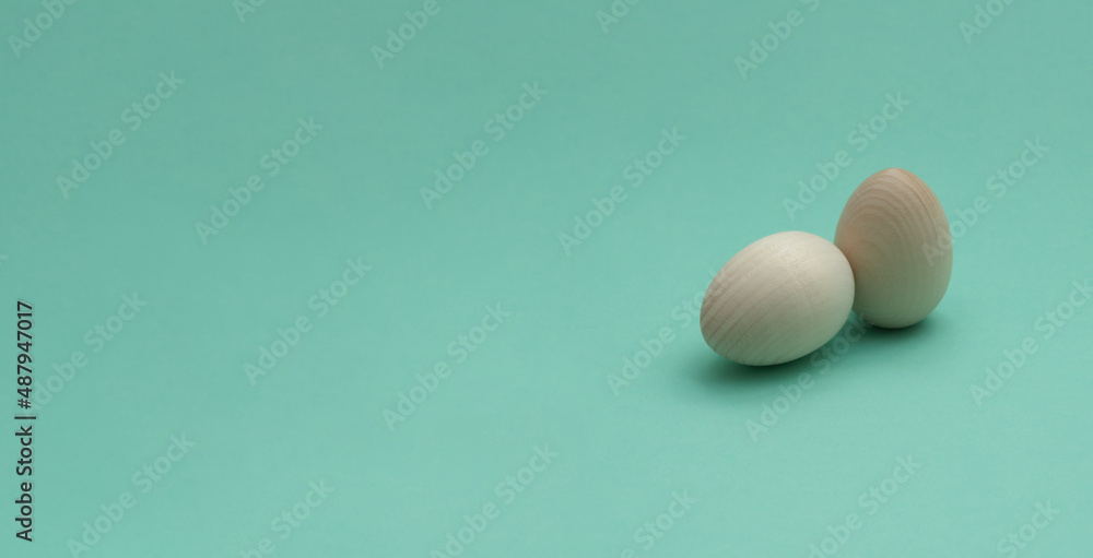 Two wooden eggs. Easter concept. Copy space. Banner Two wooden eggs. Easter concept. Copy space. Banner