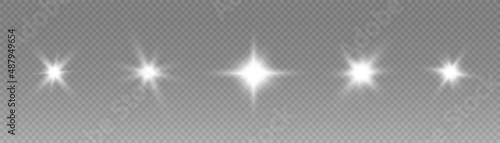 A set of flares, bright lights and sparkles on a transparent background. Golden flashes and glare. Abstract golden isolated lights Bright rays of light. Glowing lines.