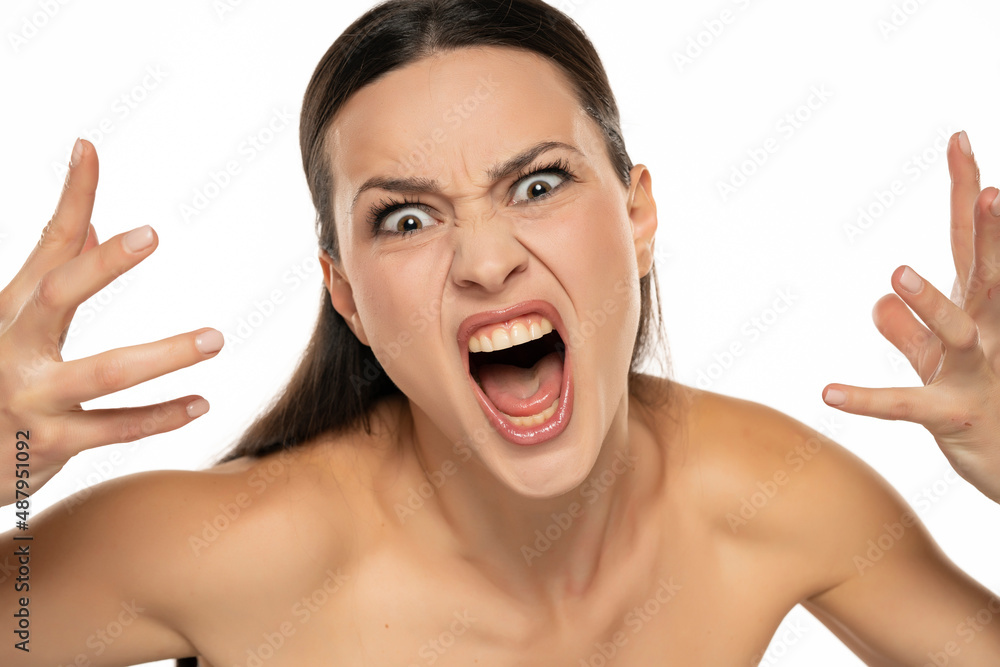 Mad emotional angry woman arguing on you on white Mad emotional angry woman arguing on you on white