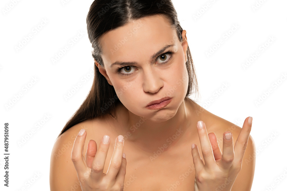 Mad emotional angry woman on white Mad emotional angry woman on white