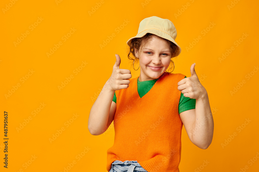 cheerful woman in orange sweater in Panama posing fashion close-up cheerful woman in orange sweater in Panama posing fashion close-up