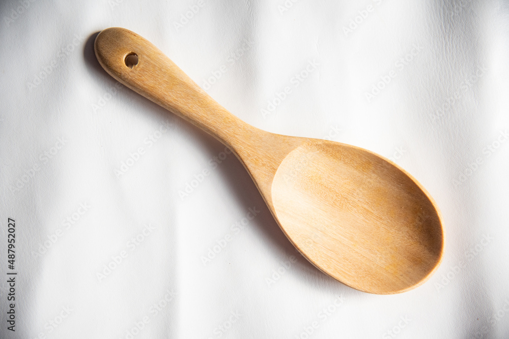 Close up spoon wood on white background. Close up spoon wood on white background.