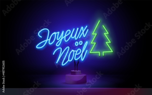 French Christmas red neon light sign on a dark background. Joyeux Noel calligraphic greeting design. Vector illustration. Joyeux Noel translation: Merry Christmas.