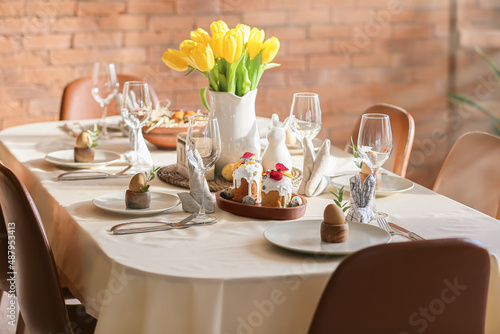 Table set for Easter celebration in room