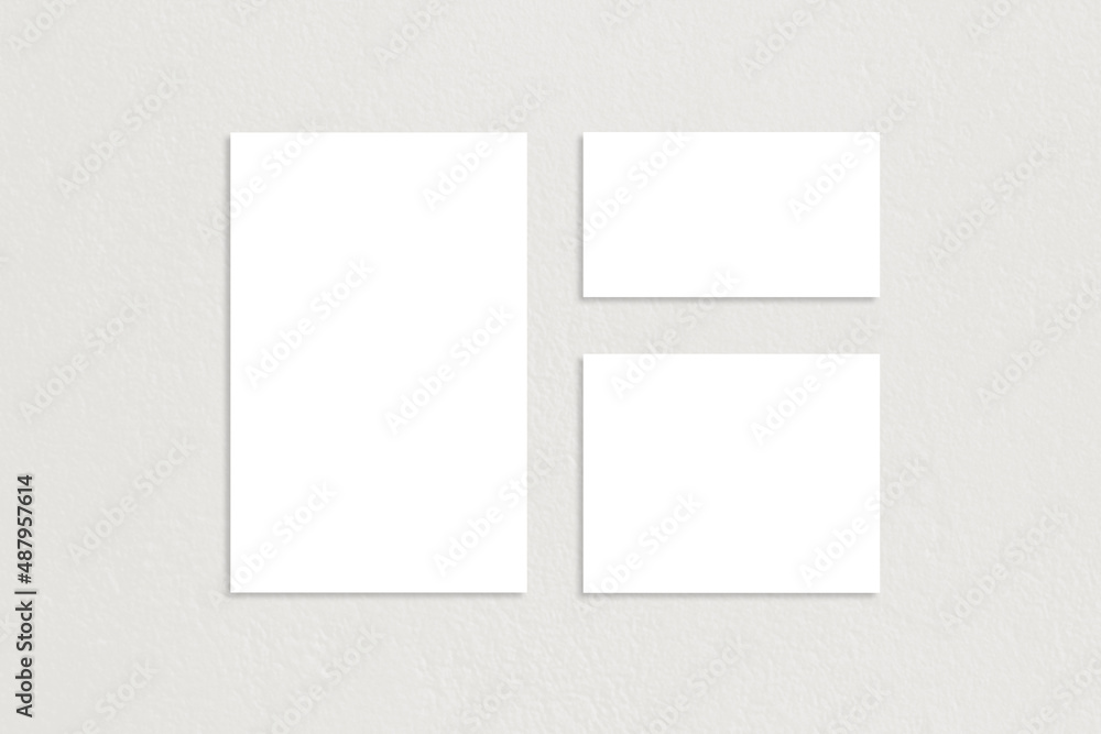 collage template of business card or sheets of paper, on a light gray background collage template of business card or sheets of paper, on a light gray background