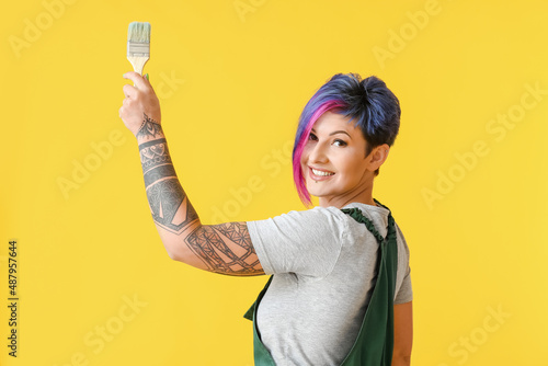 Female painter with brush o...