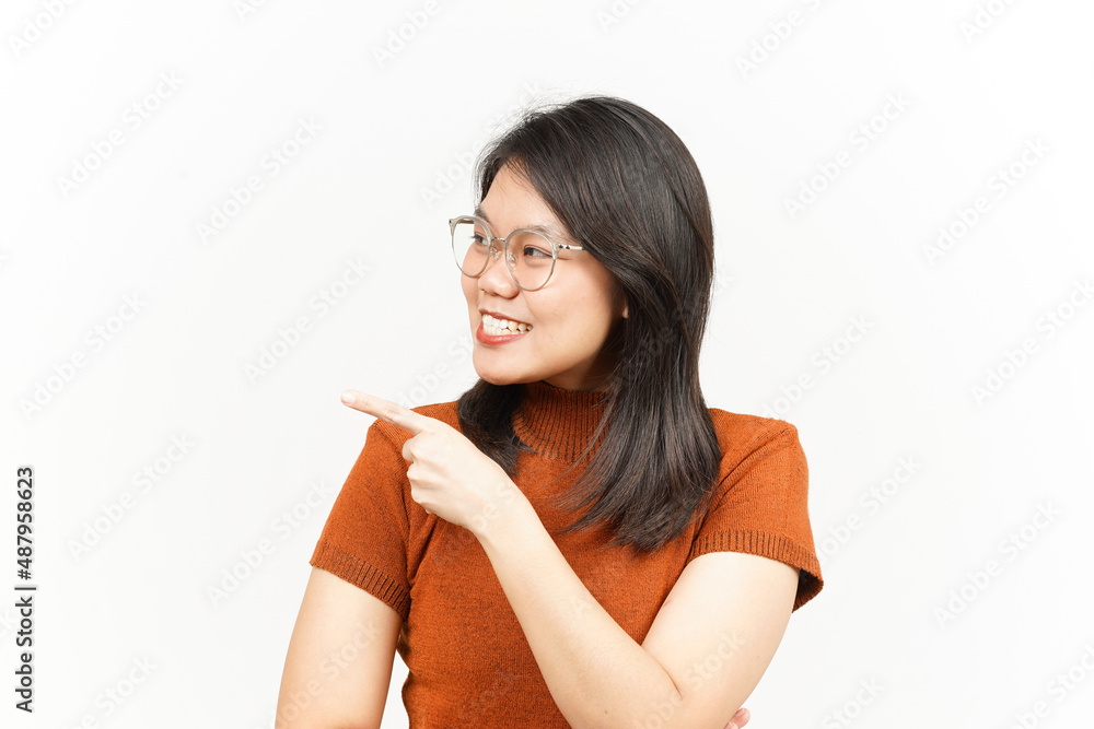 Showing Product and Pointing Side Of Beautiful Asian Woman Isolated On White Background Showing Product and Pointing Side Of Beautiful Asian Woman Isolated On White Background