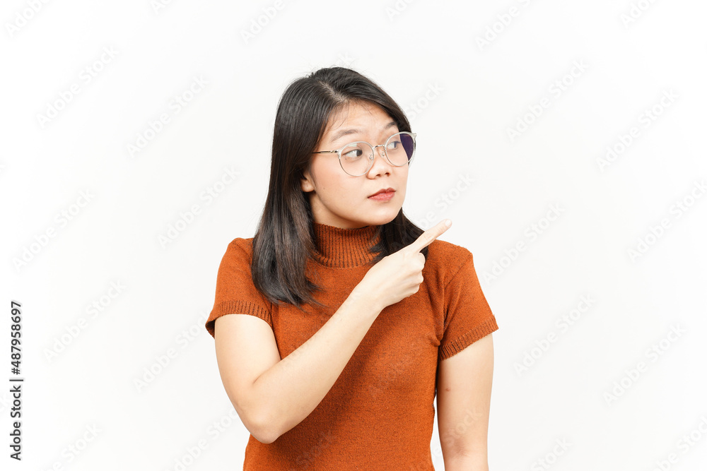 Showing Product and Pointing Side Of Beautiful Asian Woman Isolated On White Background Showing Product and Pointing Side Of Beautiful Asian Woman Isolated On White Background