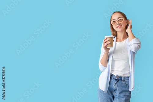 Pretty young woman in sungl...