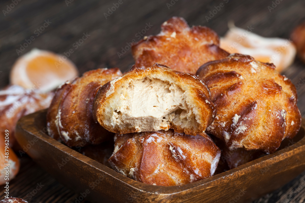small cakes with custard dough and milk filling small cakes with custard dough and milk filling