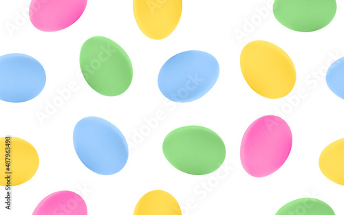 Colorful Easter eggs seamless pattern on white background.
