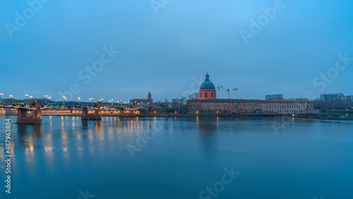 Garonne river and Dome of the 'Hopital de la Grave' at dusk in Toulouse, France