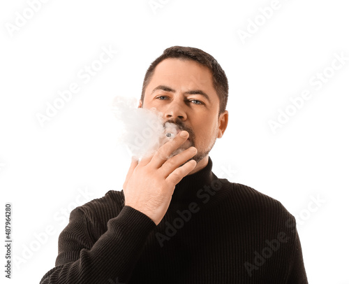 Smoking man isolated on white