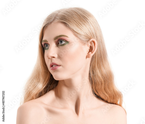 Beautiful girl with unusual eyebrows on white background