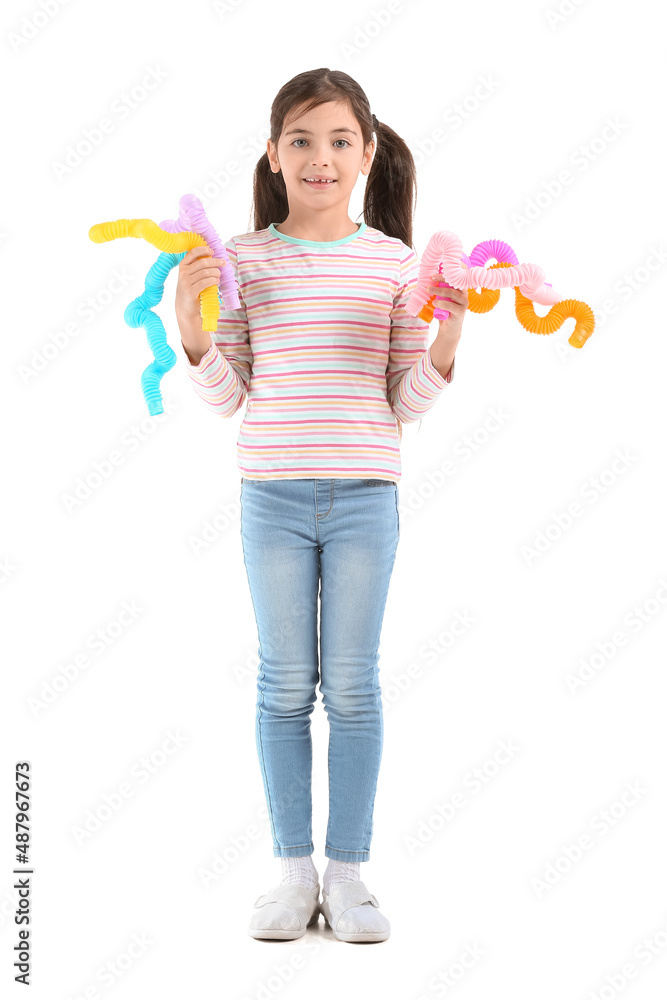 Little girl with Pop Tubes on white background