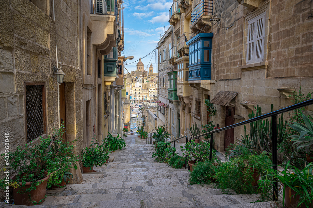 Narrow street with stairs in Valletta, Malta