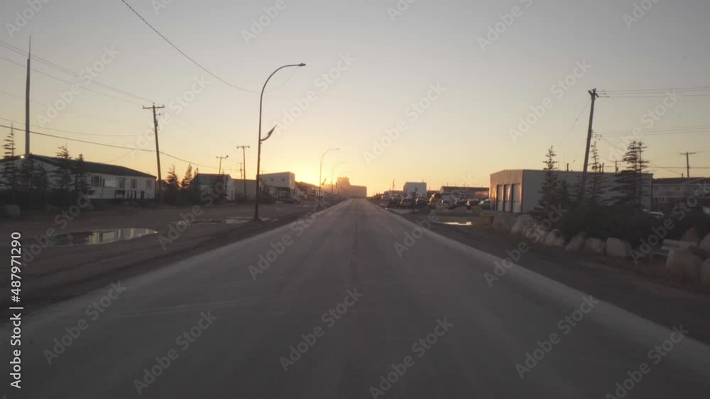 A street in Churchill, Manitoba, near Hudson Bay, in Canada at sunset. A street in Churchill, Manitoba, near Hudson Bay, in Canada at sunset.