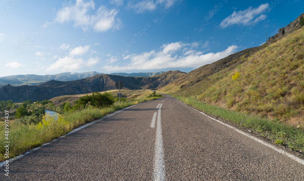 Asphalt road in Turkey, Anatolia hills in a summer day.