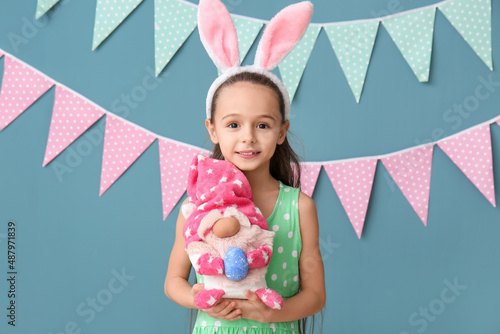 Little girl with bunny ears...