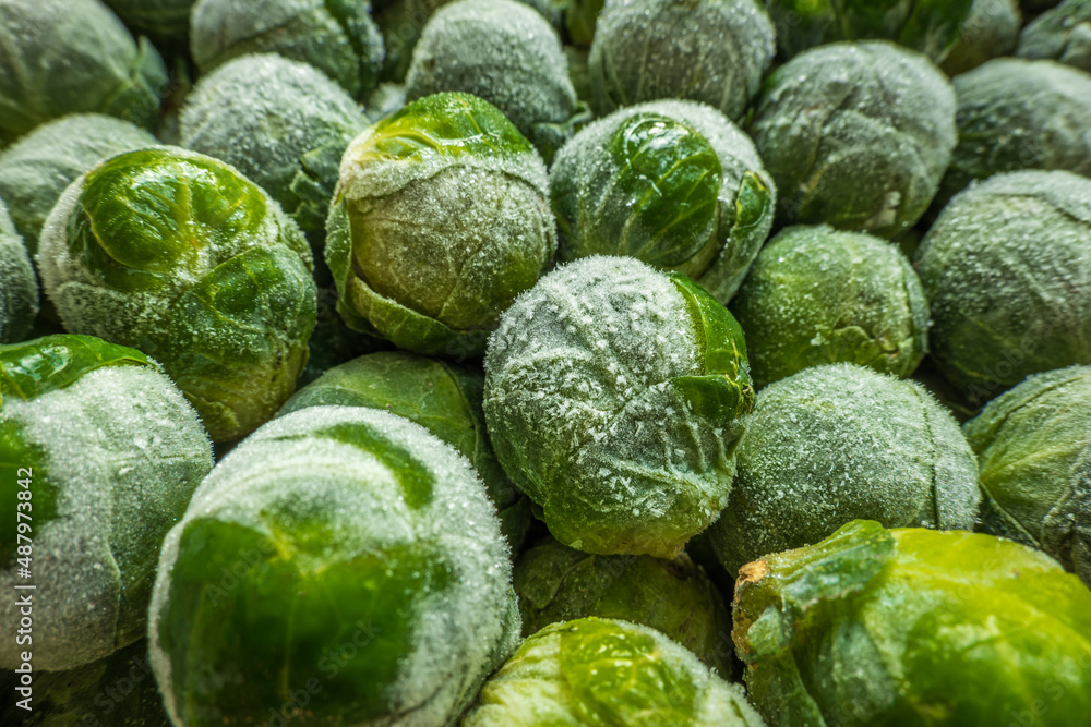 frozen brussels sprouts background closeup frozen brussels sprouts background closeup