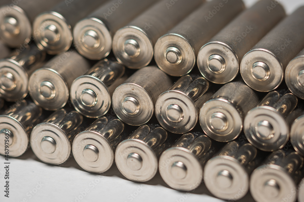 AA batteries background closeup view