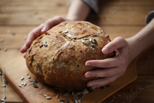 hands holding bread