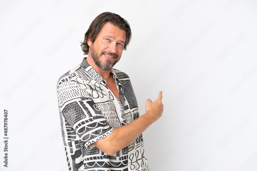 Senior dutch man isolated on white background pointing back Senior dutch man isolated on white background pointing back