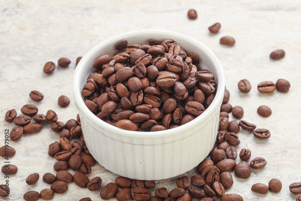 Roasted coffee bean in the bowl Roasted coffee bean in the bowl