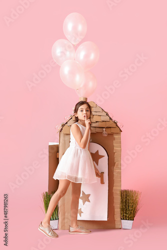 Funny little girl playing w...