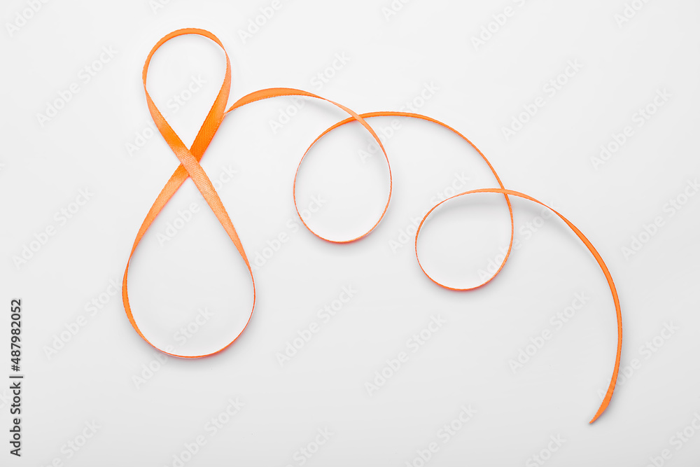Figure 8 made of ribbon for International Women's Day celebration on white background Figure 8 made of ribbon for International Women's Day celebration on white background