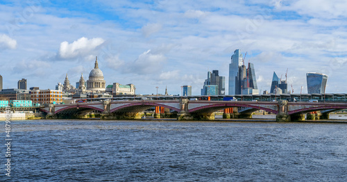 Scenic view of Blackfriars Bridge with St. Paul Cathedral and city of London in the background. photo