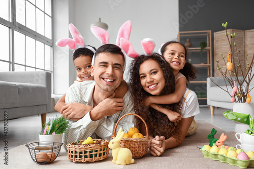 Happy parents with their li...