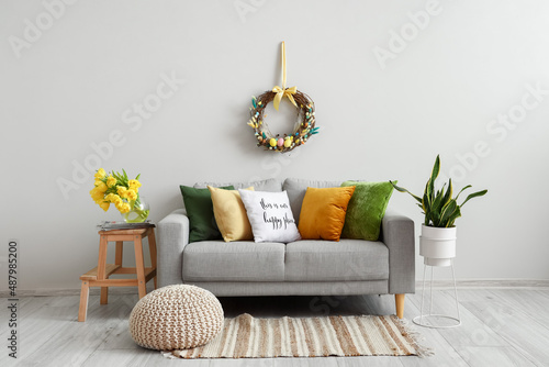 Comfortable sofa near light...