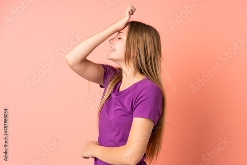 Teenager Ukrainian girl isolated on pink background has realized something and intending the solution