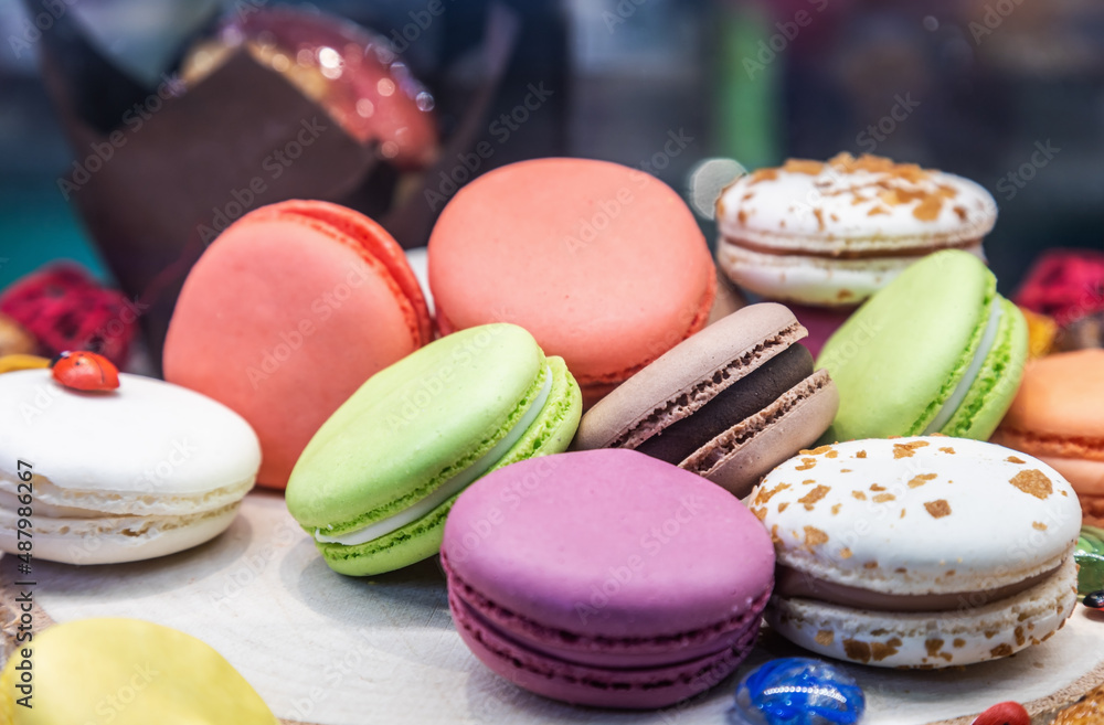 Fototapeta premium macaroon cakes with different fillings on the counter