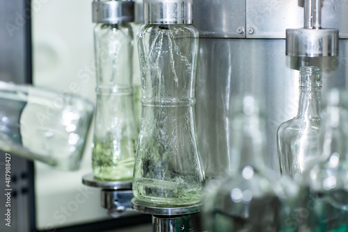 Wallpaper Mural Bottles with a drink closed with a screw cap. Factory for the production of alcoholic beverages Torontodigital.ca