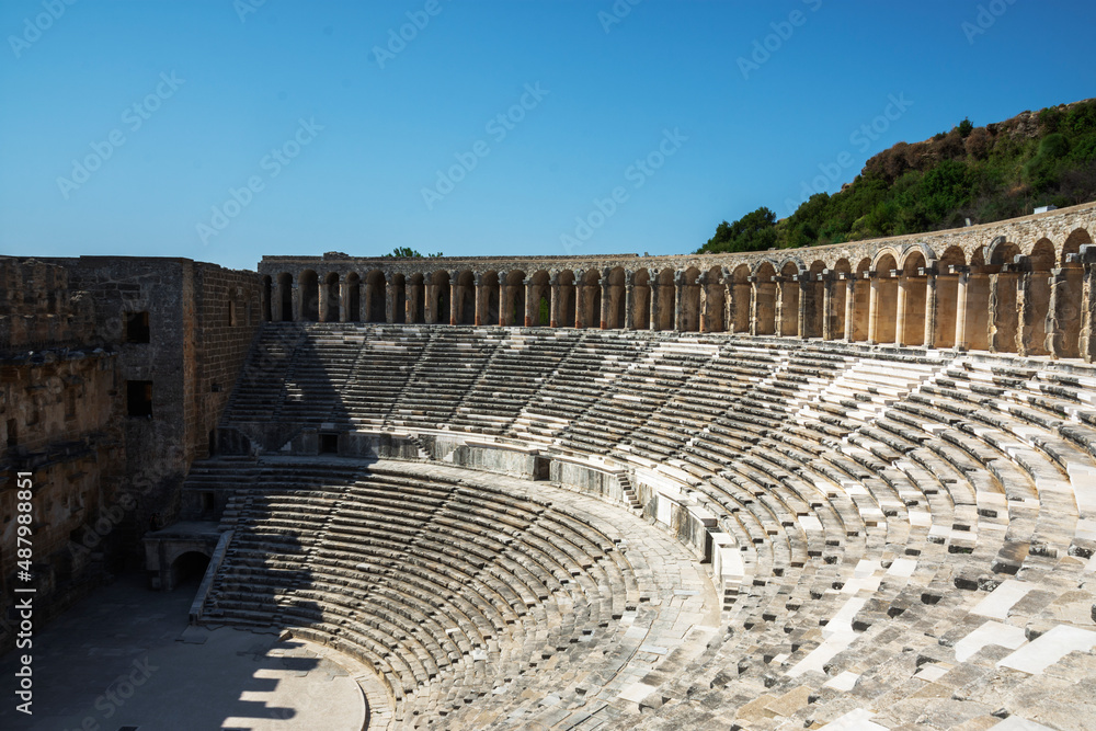 Ancient Roman amphitheater of Aspendos near Antalya. Historical destinations concept.