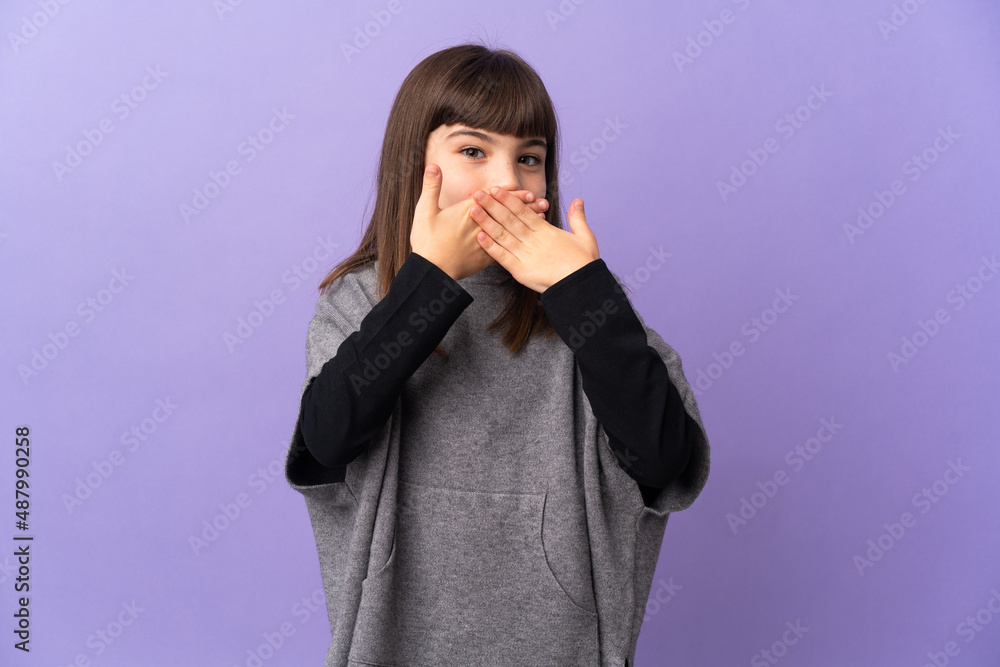 Little girl over isolated background covering mouth with hands Little girl over isolated background covering mouth with hands